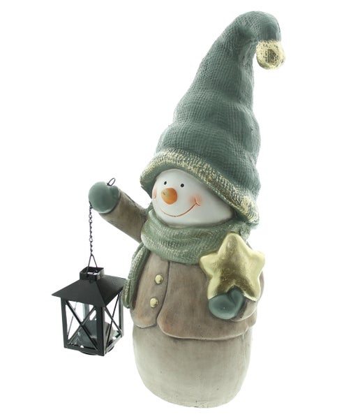 Schneemann-Figur mit Mütze, Laterne und Stern als Weihnachtsdekoration