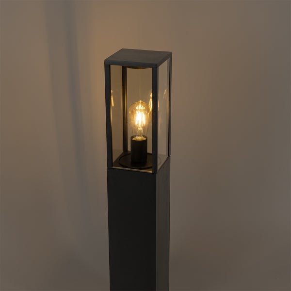 Moderne Wegeleuchte aus Metall und Glas mit sichtbarem LED-Leuchtmittel im Vintage-Stil.