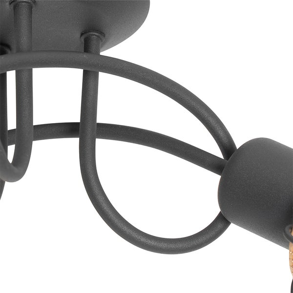 Detail einer Deckenleuchte mit Metallgestell