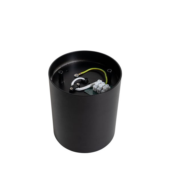 Innenansicht einer schwarzen zylinderförmigen Deckenleuchte mit elektrischen Anschlüssen