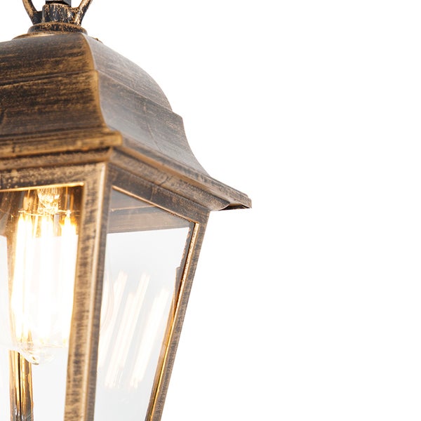 Außenwandleuchte im Laternendesign mit Metallgehäuse in Antikgold und Klarglas.
