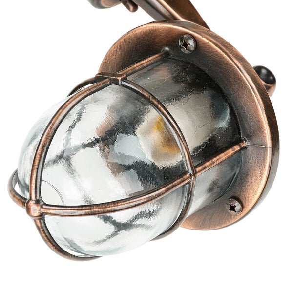 Wandleuchte mit Schutzkorb und klarem Glas