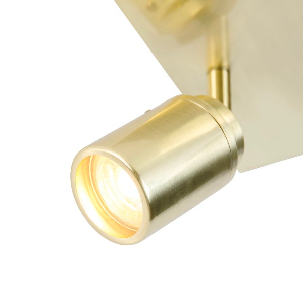 Goldfarbener Deckenstrahler mit einem Lichtpunkt