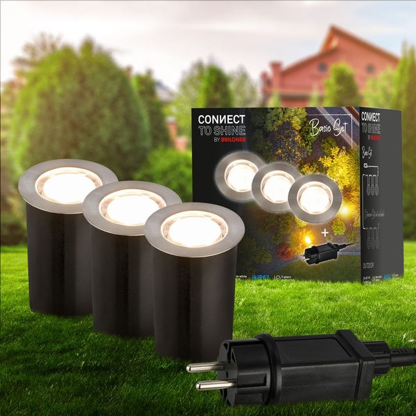 Briloner Connect to Shine LED Bodeneinbauleuchten-Set für den Außenbereich mit drei Strahlern, einer Zuleitung und einem Stecker.