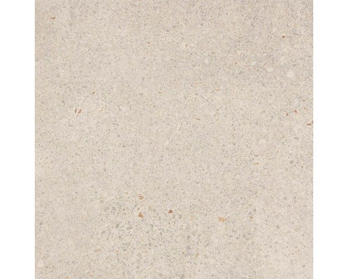 Nahaufnahme einer Bodenfliese mit Terrazzo Optik.