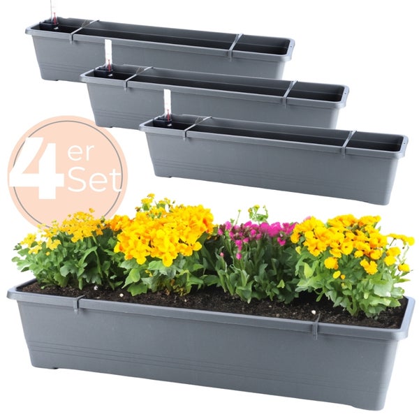 Vier graue Blumenkästen im Set, einer bepflanzt mit bunten Blumen
