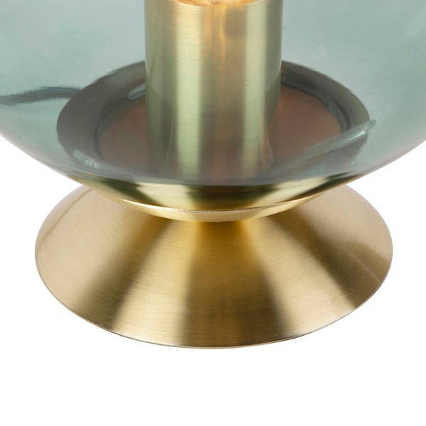 Detailansicht einer Tischleuchte mit Metallsockel und Glasschirm