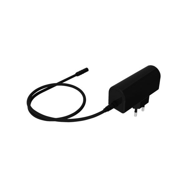 Ein elektrisches Steckernetzteil mit Kabel für die Stromversorgung von Geräten.