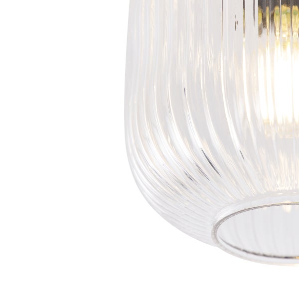 Detailaufnahme einer Glasleuchte mit gerippter Oberfläche