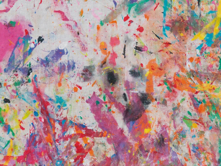 Nahaufnahme einer Stoffoberfläche mit Farbspritzern