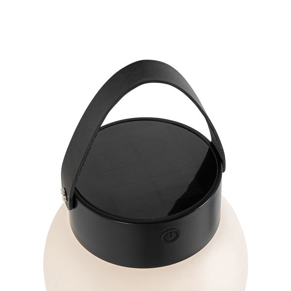 Solarbetriebene Außenleuchte mit Solarpanel auf der Oberseite, Tragegriff und Einschaltknopf.