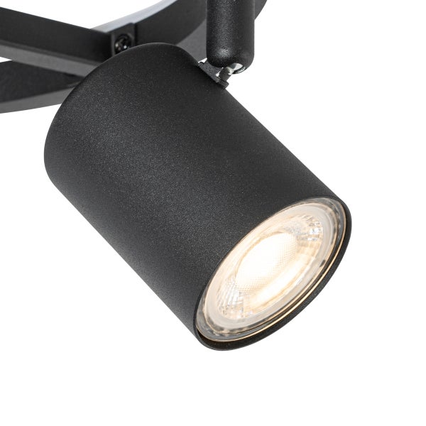 Detailaufnahme eines schwarzen Strahlers mit Leuchtmittel