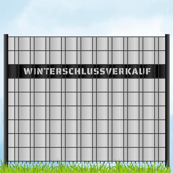 Zaun mit der Aufschrift Winterschlussverkauf