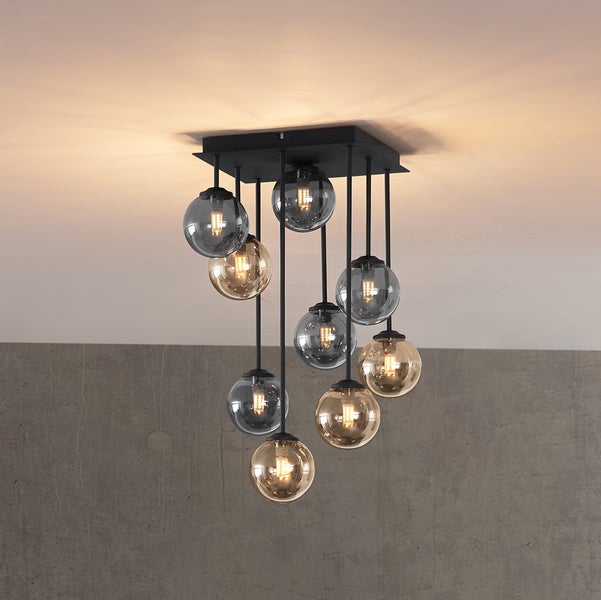 Deckenleuchte mit neun runden Lampenschirmen aus Glas