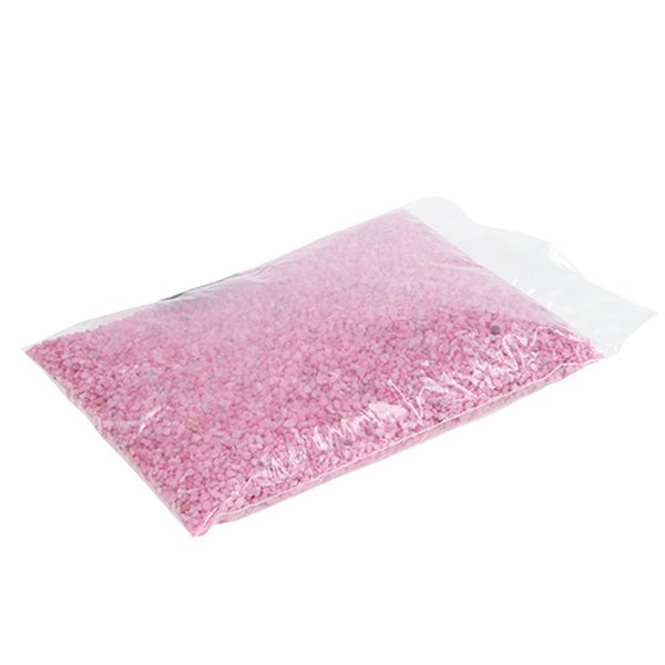 Dekokies in Rosa in einem transparenten Beutel.