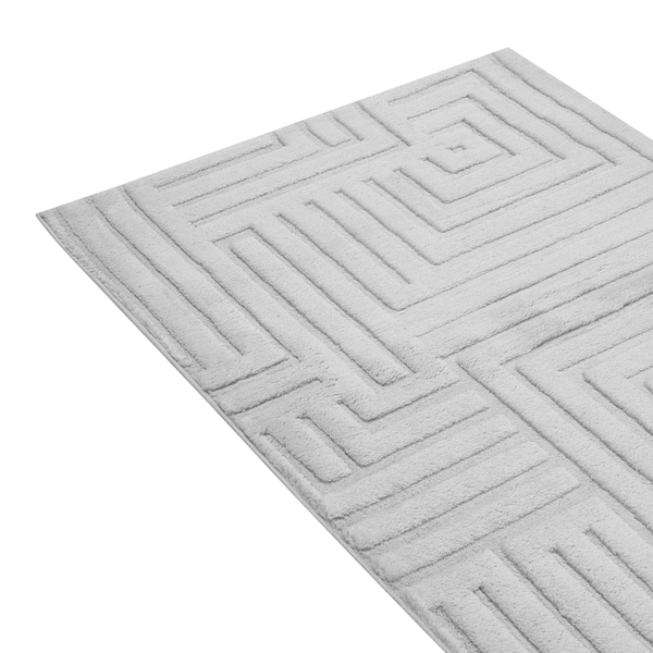Badvorleger mit geometrischem Reliefmuster aus weichem Material