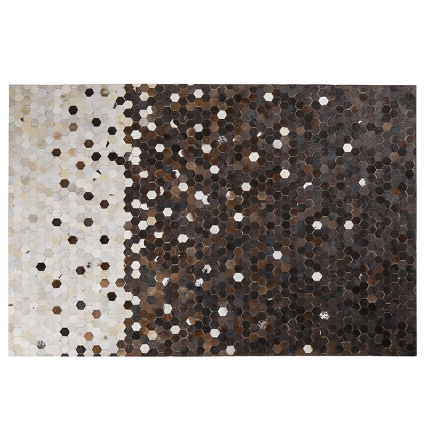 Teppich aus Leder in Hexagonoptik mit Farbverlauf.
