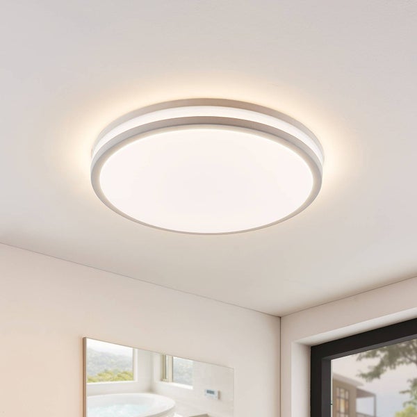 Runde LED-Deckenleuchte in modernem, flachem Design an einer weißen Decke montiert.