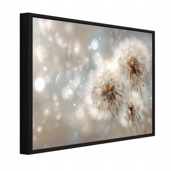 Gerahmtes Wandbild mit drei Pusteblumen auf einem sanft verschwommenen Hintergrund, schwarzer Rahmen.