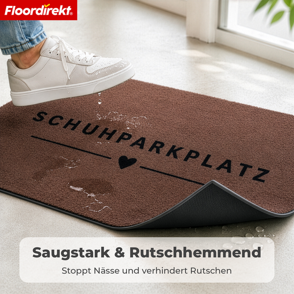 Fußmatte mit Schriftzug Schuhparkplatz, saugstark und rutschhemmend für den Innenbereich, Floordirekt Logo.