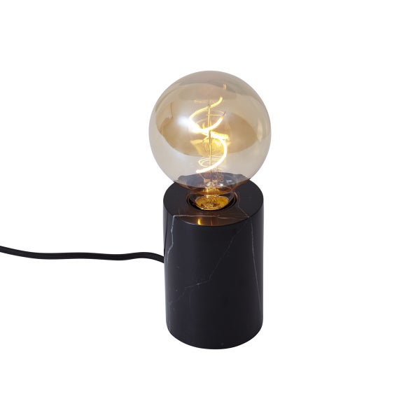Tischleuchte mit zylindrischem Sockel aus schwarzem Marmor und einer großen LED-Filament-Glühbirne in Kugelform.