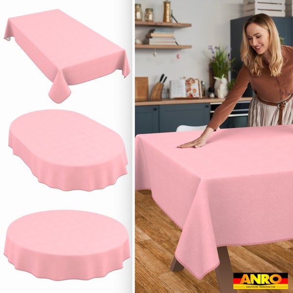Tischdecke in rechteckiger, ovaler und runder Form. Eine Frau legt die Decke in einer hellen Küche auf einen Tisch. ANRO Logo.