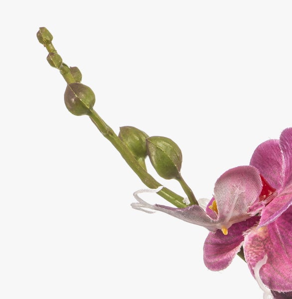 Künstlicher Orchideenzweig mit lila Blüten und grünen Knospen