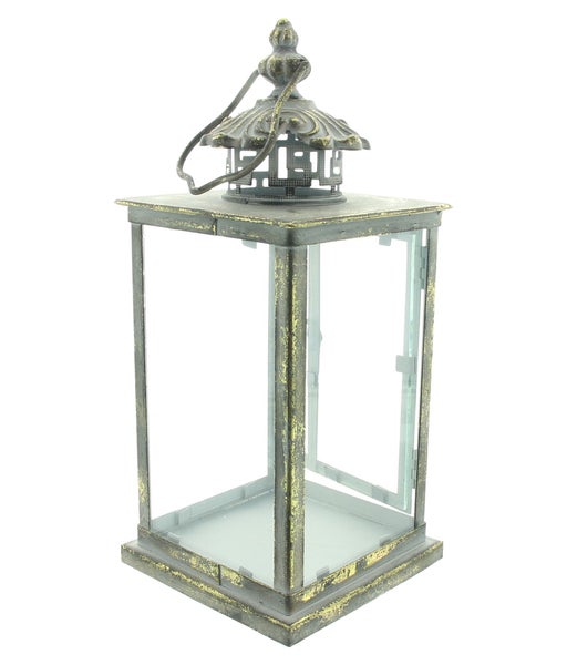 Dekorative Laterne aus Metall und Glas im Vintage-Stil mit verzierten Details und Tragegriff.