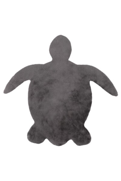 Ein Kinderteppich in Form einer Schildkröte aus weichem Flor für das Kinderzimmer.