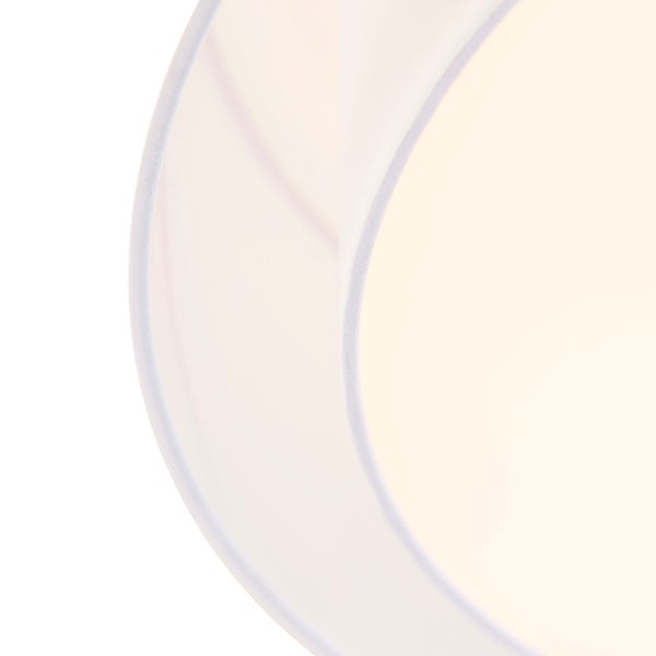 Nahaufnahme eines runden Lampenschirms aus weißem Textil für Deckenleuchten.