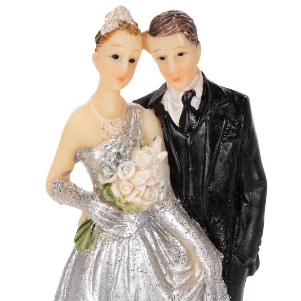 Dekorative Brautpaar-Figur für Hochzeiten, Braut in glitzerndem Kleid mit Blumenstrauß und Bräutigam im schwarzen Anzug.