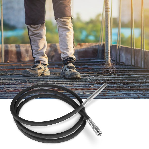 Betonrüttler mit Bauarbeiter bei der Arbeit auf einer Baustelle