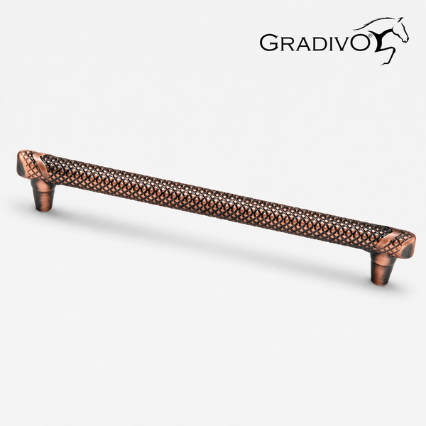 Möbelgriff Gradivo in Antik-Kupfer mit Rautenmuster und Gradivo Logo.