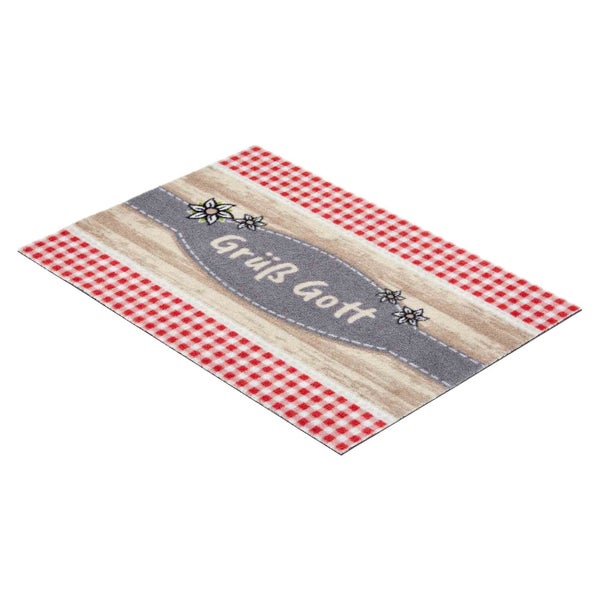 Fußmatte mit der Aufschrift Grüß Gott und rot kariertem Rand
