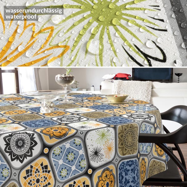Wasserundurchlässige runde Tischdecke mit Fliesenmuster und Ornamenten im Wohnzimmer. Detailansicht der wasserabweisenden Oberfläche mit Wassertropfen.