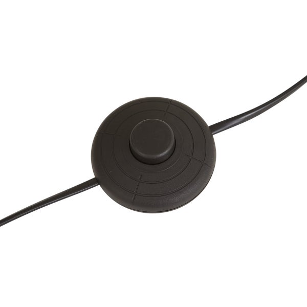 Runder, schwarzer Fußschalter mit Kabel.