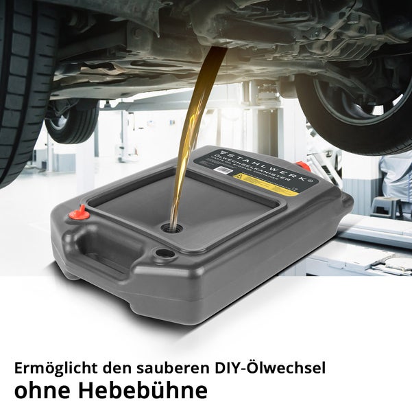 Ölwechselbehälter unter einem Auto beim Ablassen von Öl