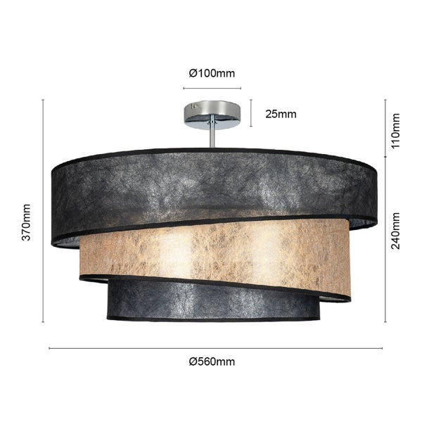 Detailansicht eines gestuften Lampenschirms aus strukturiertem Stoff in Schwarz und Gold.