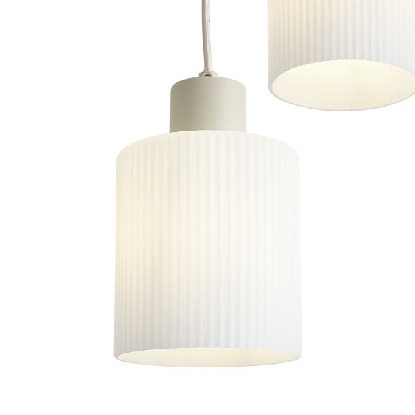 Moderne zylindrische Pendelleuchte aus geriffeltem Glas mit Textilkabel.