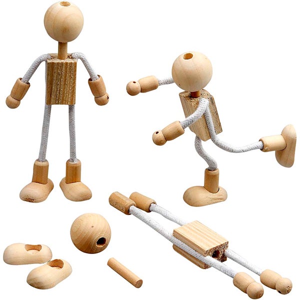 Holzpuppe in verschiedenen Posen und Einzelteilen