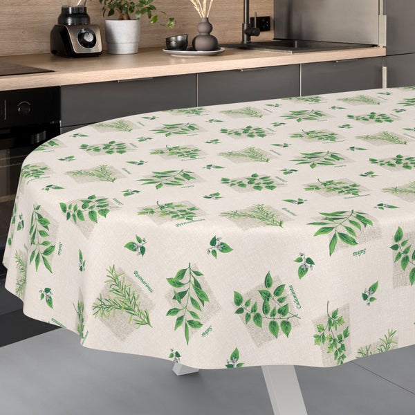 Ovale Tischdecke mit Kräutermotiven wie Rosmarin und Salbei in einer modern eingerichteten Küche.