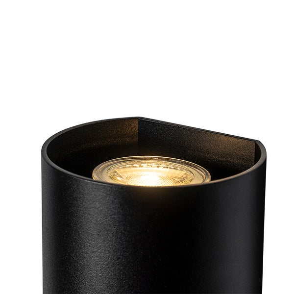 Schwarze Wandleuchte mit Licht