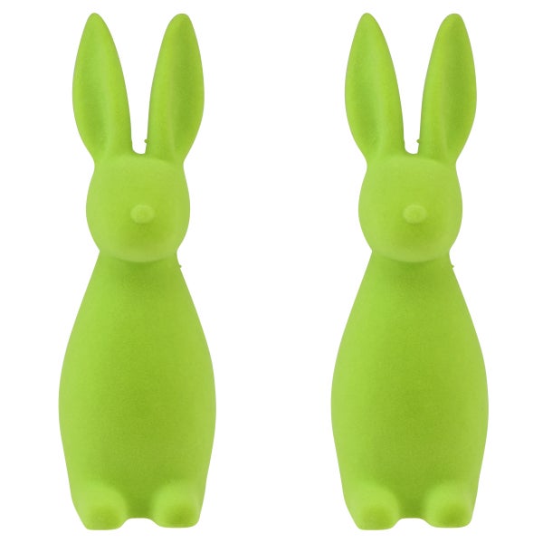 Zwei grüne Hasenfiguren als Dekoration