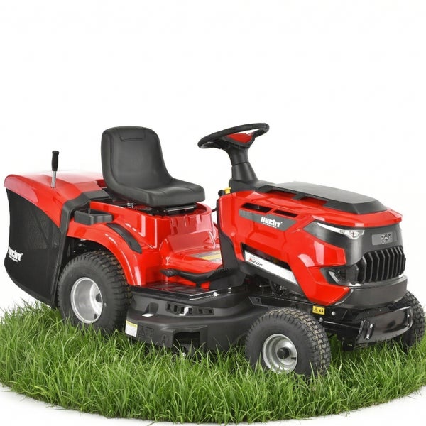 Roter Rasentraktor von Hecht mit Fangkorb auf einer Grasfläche.