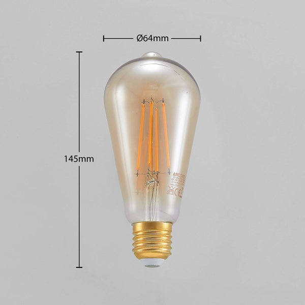 LED-Filament-Leuchtmittel in Edison-Form mit E27-Sockel, Höhe 145 Millimeter und Durchmesser 64 Millimeter.