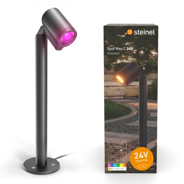 Steinel Spot Way C 24 Volt Gartenstrahler mit schwenkbarem Leuchtenkopf und runder Basis inklusive Produktverpackung.