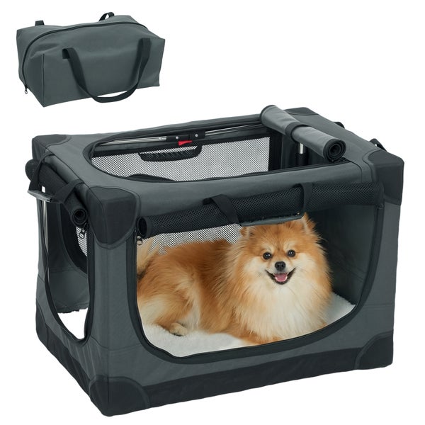 Faltbare graue Hundetransportbox aus Stoff mit Netzeinsätzen und Tragegriffen, inklusive Hund im Inneren und passender Aufbewahrungstasche.