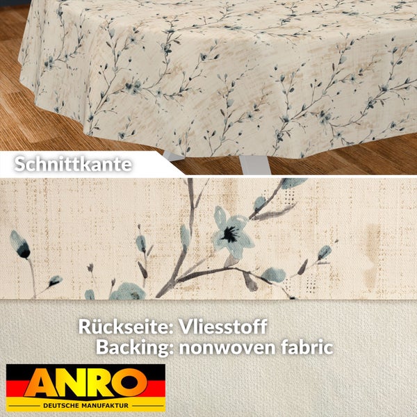 Wachstuch-Tischdecke mit floralem Muster, Detail der Schnittkante und der Vliesrückseite, ANRO Logo.