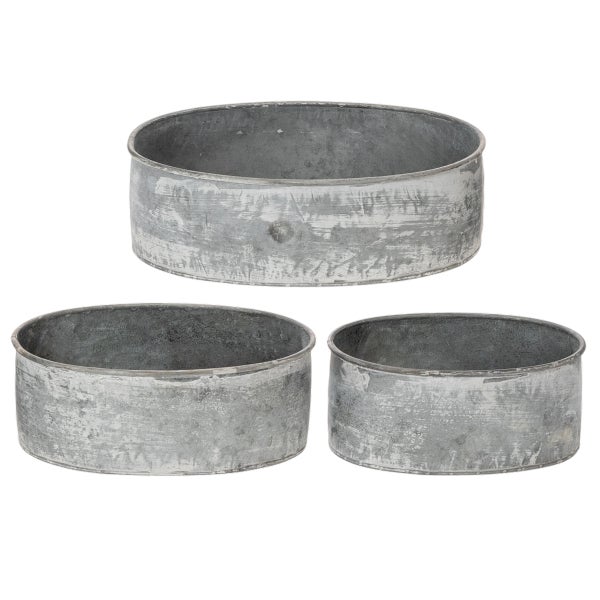 Set aus drei runden Pflanzschalen aus Metall in verschiedenen Größen mit rustikaler Zink-Oberfläche.