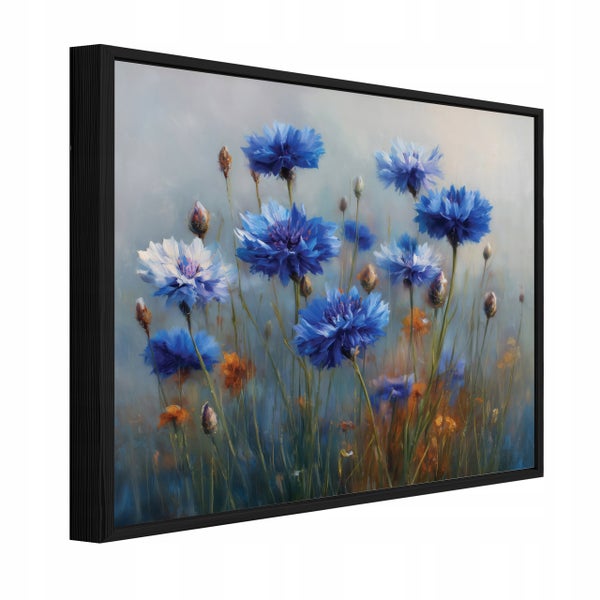 Wandbild mit Kornblumen Motiv in einem schwarzen Rahmen in perspektivischer Ansicht